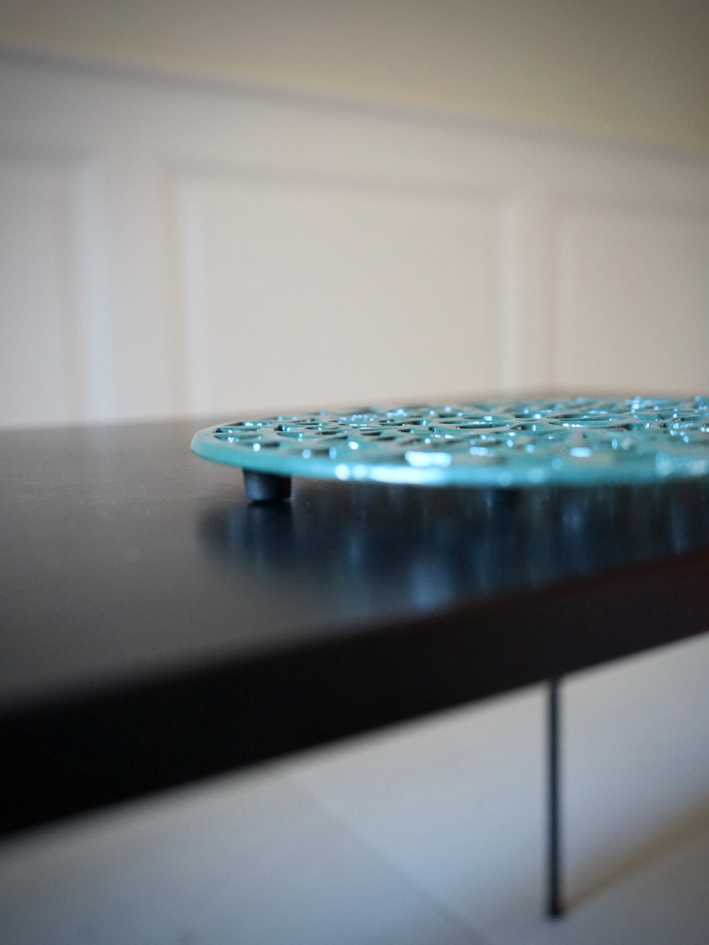 Dessous de plat en fonte